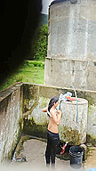 Indian Village Girl Bathing Near Water Tank Outdoor